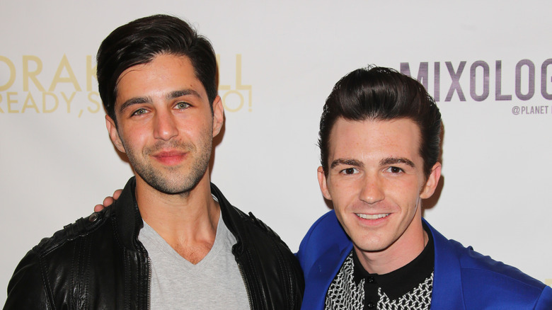 Drake Bell and Josh Peck posing for photos