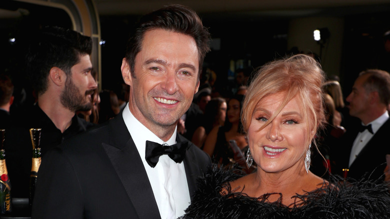 Hugh Jackman and Deborra-lee Furness smiling at the 75th Annual Golden Globe Awards in January 2018