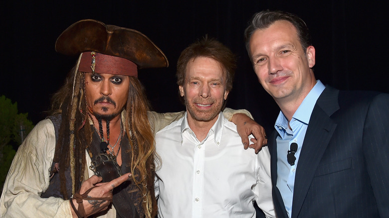 Johnny Depp as Jack Sparrow poses with Disney executive Sean Bailey