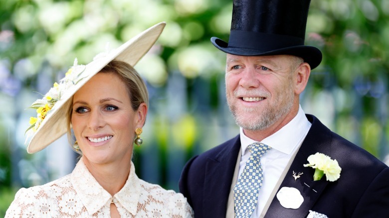 Zara and Mike Tindall smiling at event 