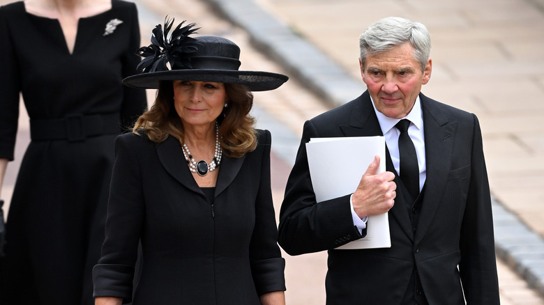 Carole Middleton and Michael Middleton arriving at funeral