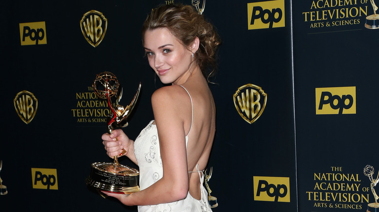 Hunter King posing with her Daytime Emmy