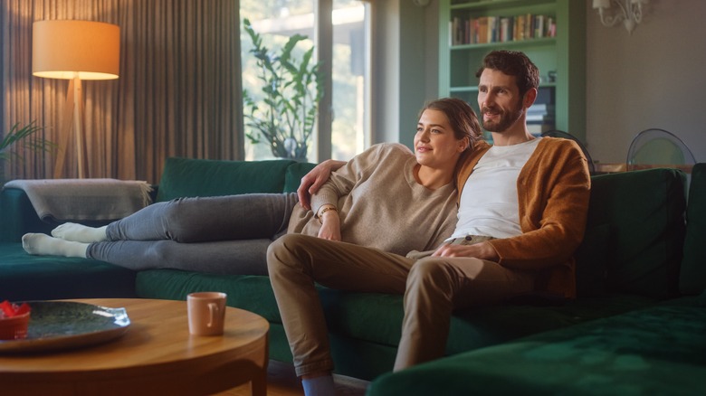 Couple watching TV together