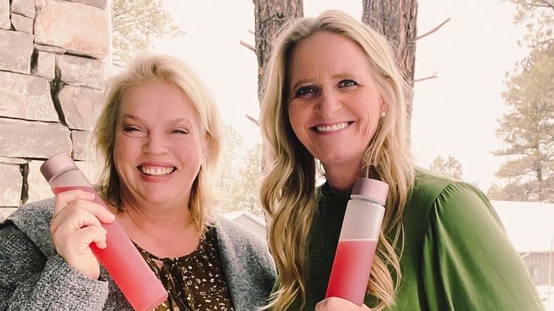 Janelle and Christine Brown posing with bottles of Plexus