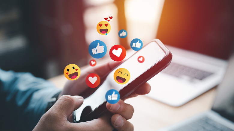 social media emojis coming from phone