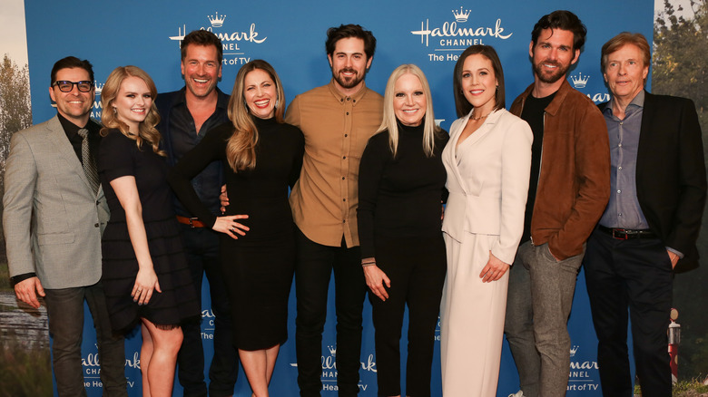 The cast of When Calls the Heart posing together at an event