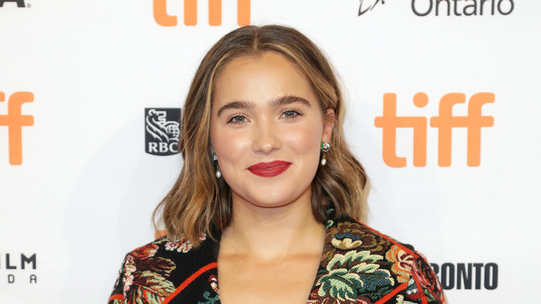 Haley Lu Richardson poses on the red carpet at TIFF