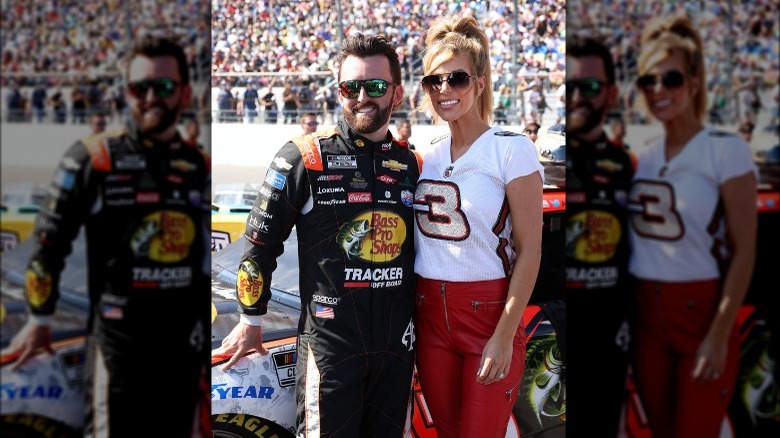 Austin and Whitney Dillon posing at a race track