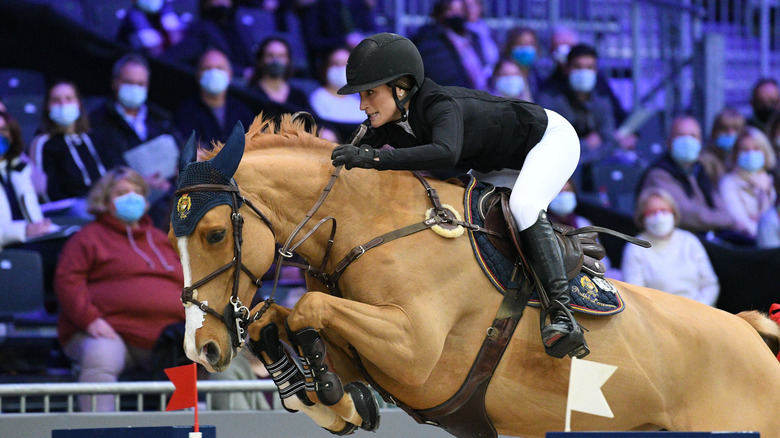 Jessica Springsteen riding a horse