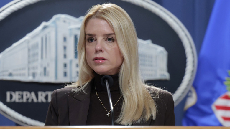 Pam Bondi speaking at a podium