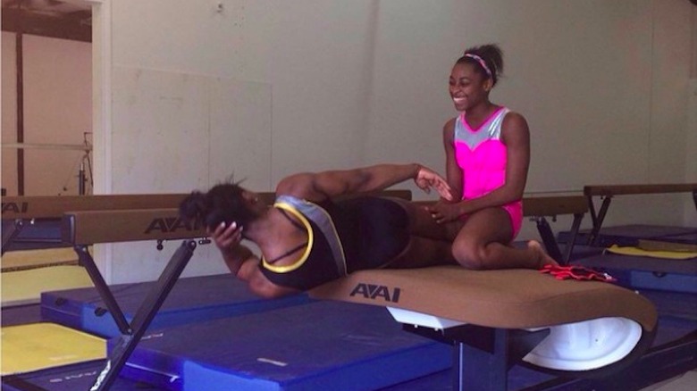 Adria Biles training with sister Simone Biles