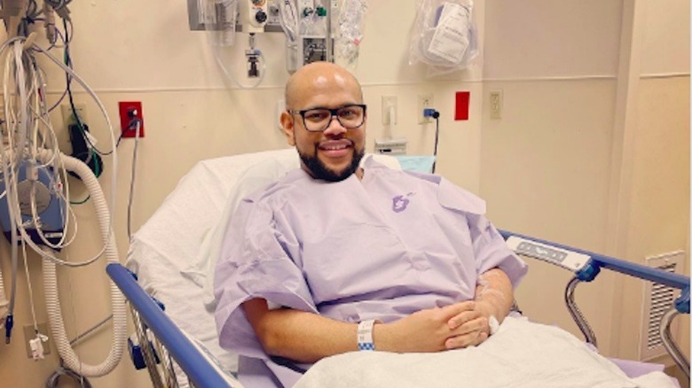 Ron Biles Jr. in a hospital bed