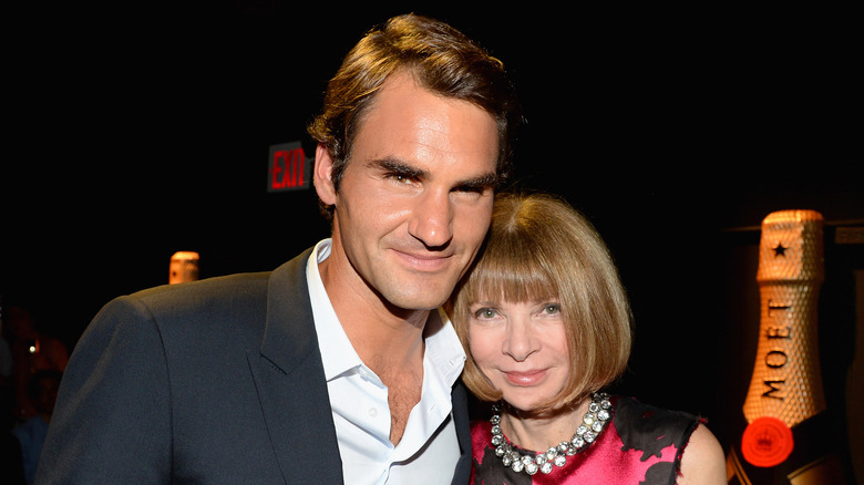 Roger Federer and Anna Wintour smiling 