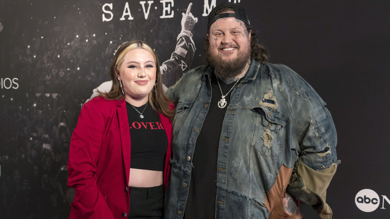 Bailee Ann and Jelly Roll smiling on the red carpet