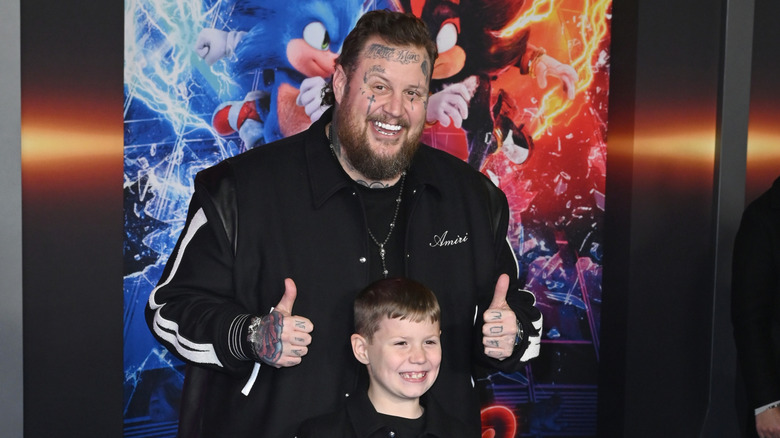 Jelly Roll with his son, Noah, smiling at the Sonic 3 premiere