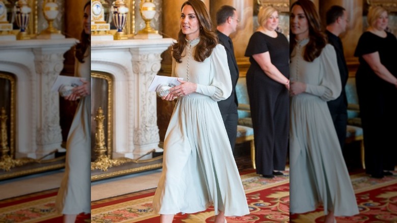 Kate Middleton walking in blue dress