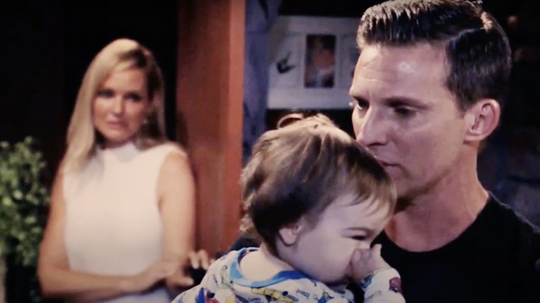 Steve Burton holding a child