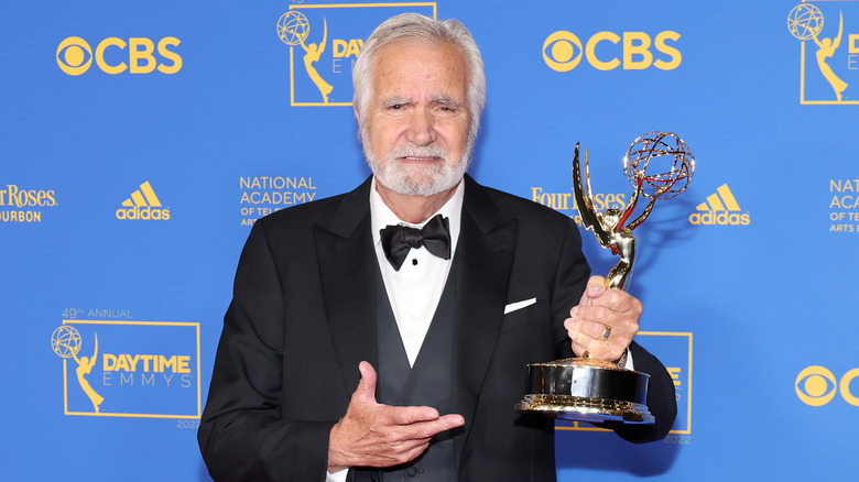 John McCook holding Emmy award