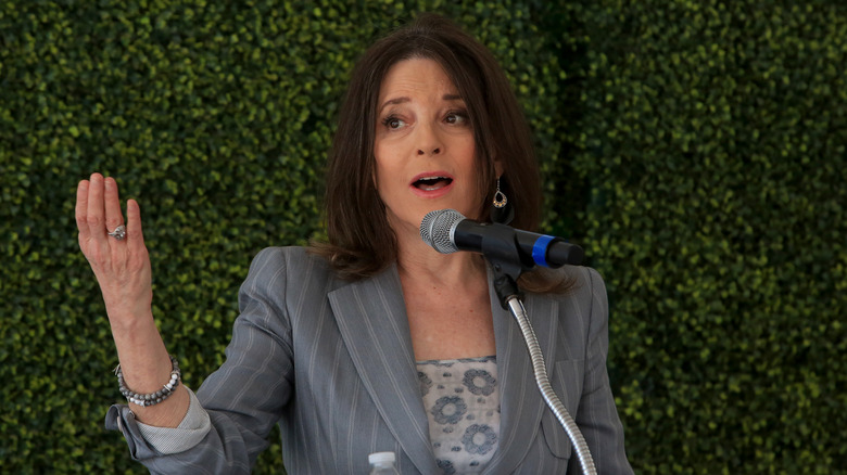 Marianne Williamson speaking onstage