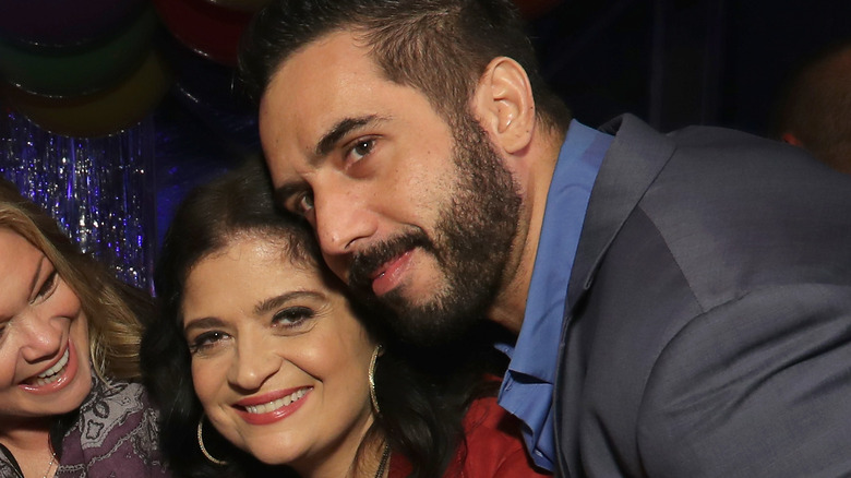 Alex Guarnaschelli and Michael Castellon posing together