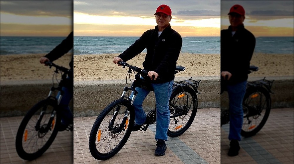 Captain Glenn Shephard poses on his bike