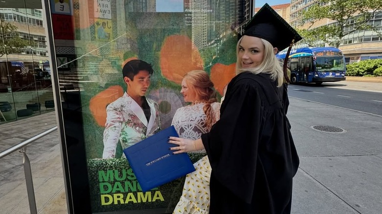 Ella Stiller poses in her graduation cap and gown