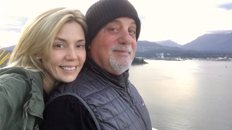 Selfie of Alexis Roderick and Billy Joel outside