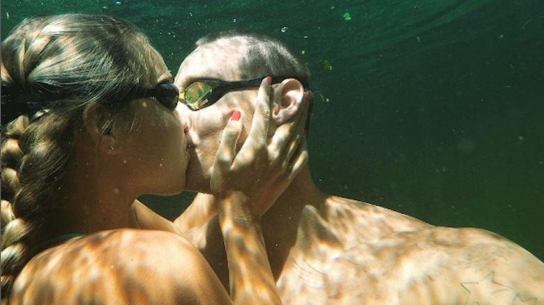 Meghan Dressel kissing Caeleb Dressel underwater