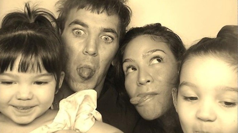 Alex Fine, Cassie Ventura and daughters making funny faces