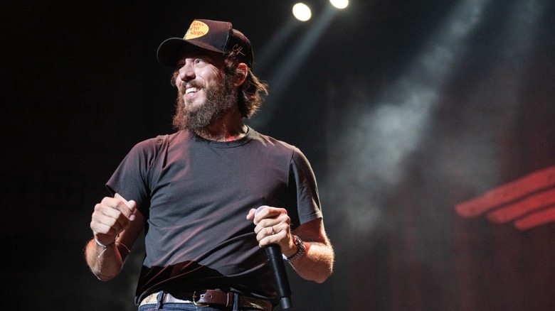 Chris Janson smiling onstage