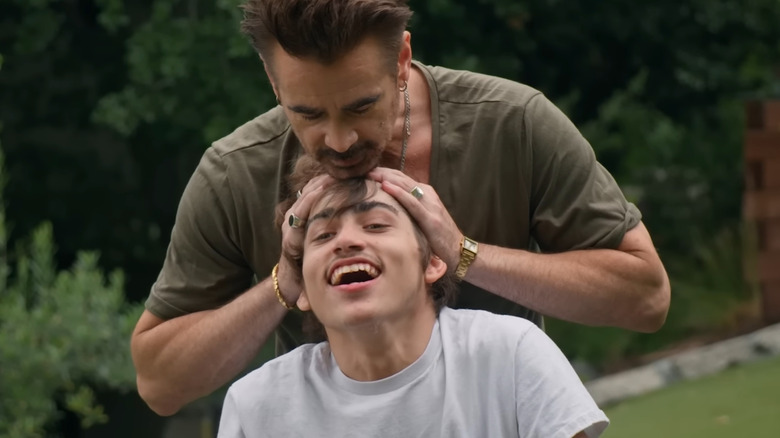 Colin Farrell holding James Farrell's head