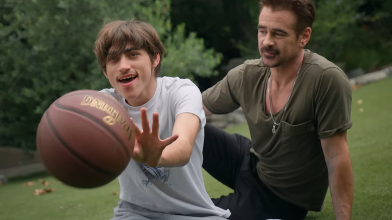 Colin Farrell and James Farrell playing outside with basketball