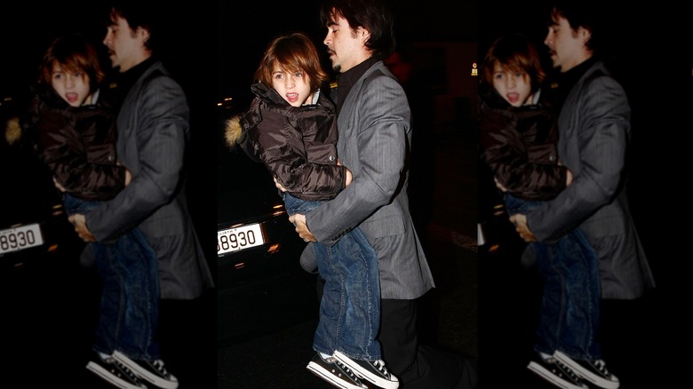 Colin Farrell carrying his son James Farrell