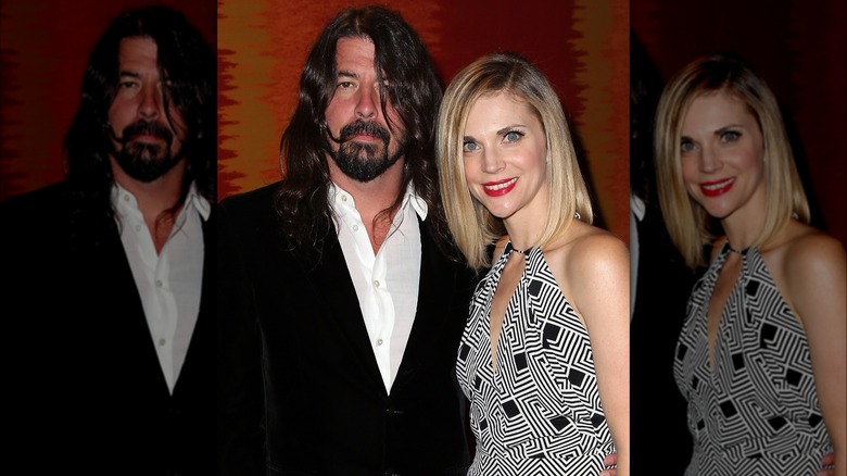 Jordyn Blum in black and white halter neck dress and Dave Grohl in white shirt and black blazer