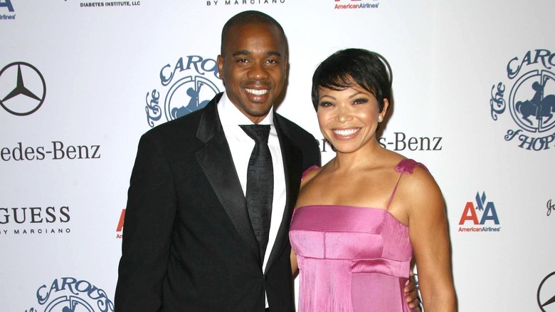 Tisha Campbell posing with Duane Martin