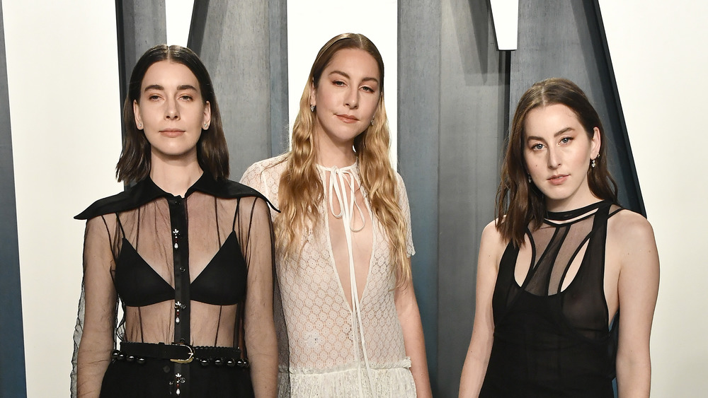 Haim wearing black and white