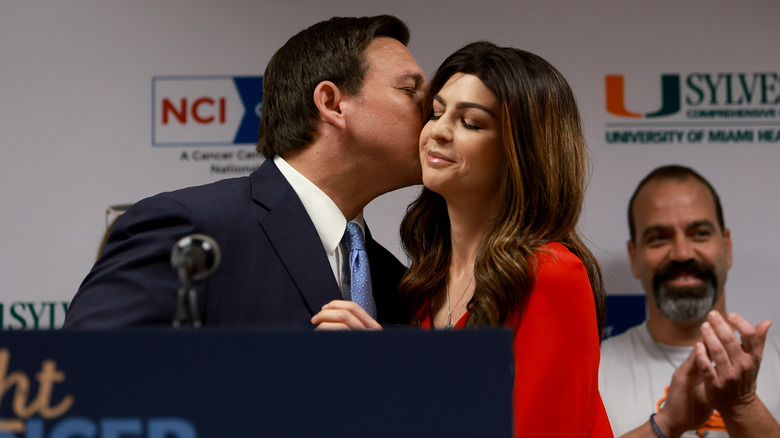 Ron DeSantis kisses his wife onstage