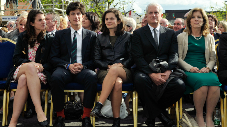 Tatiana Schlossberg sitting with her family