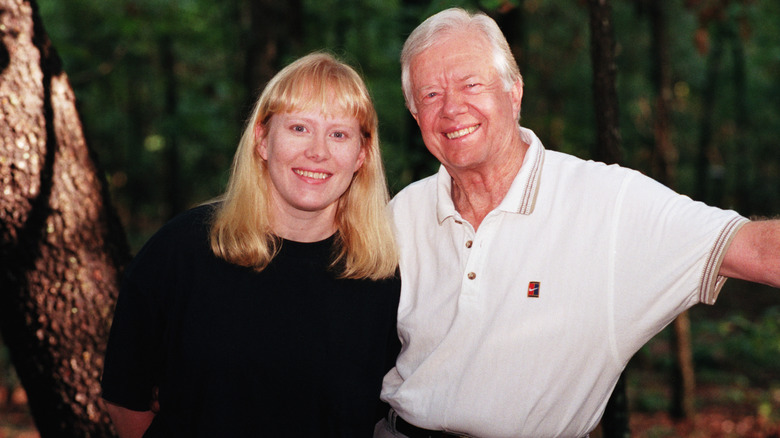 Amy Carter and Jimmy Carter smiling