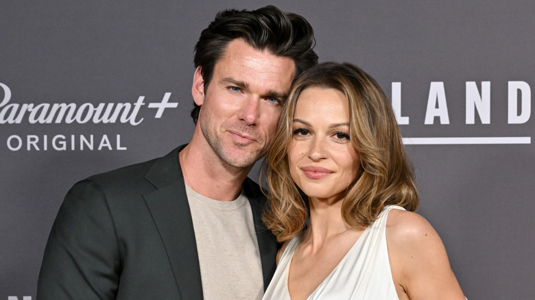 Kevin McGarry and Kayla Wallace posing together red carpet