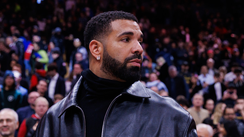 Drake candid photo at sporting event