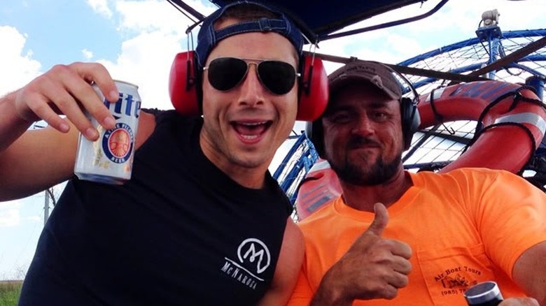 Glen Powell and Jeremy Dufrene on airboat