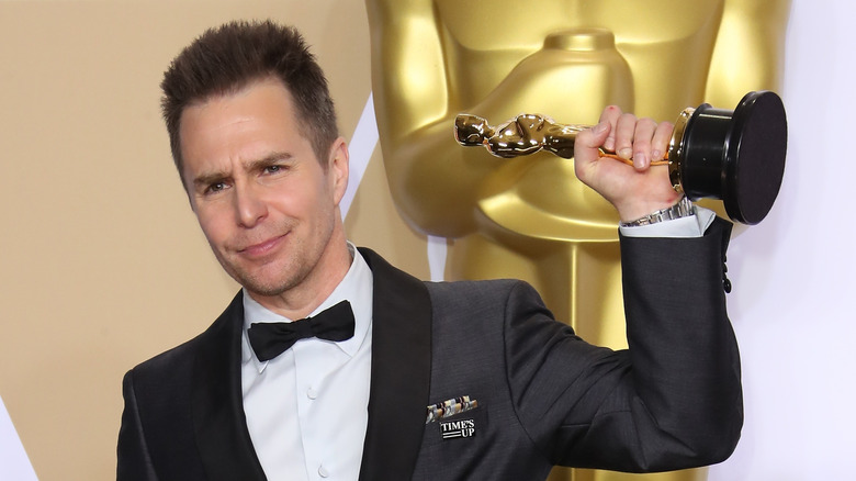 Sam Rockwell holds up his Oscar at the Academy Awards