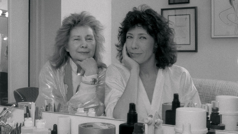 Jane Wagner and Lily Tomlin posing in dressing room 