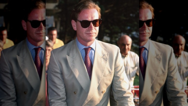 Major James Hewitt wearing sunglasses