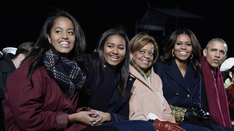 Malia Obama, Sasha Obama, mother-in-law Marian Robinson, first lady Michelle Obama and President Barack Obama attend the national Christmas tree lighting ceremony on the Ellipse south of the White House December 3, 2015 in Washington, DC. The lighting of the tree is an annual tradition attended by the president and the first family.