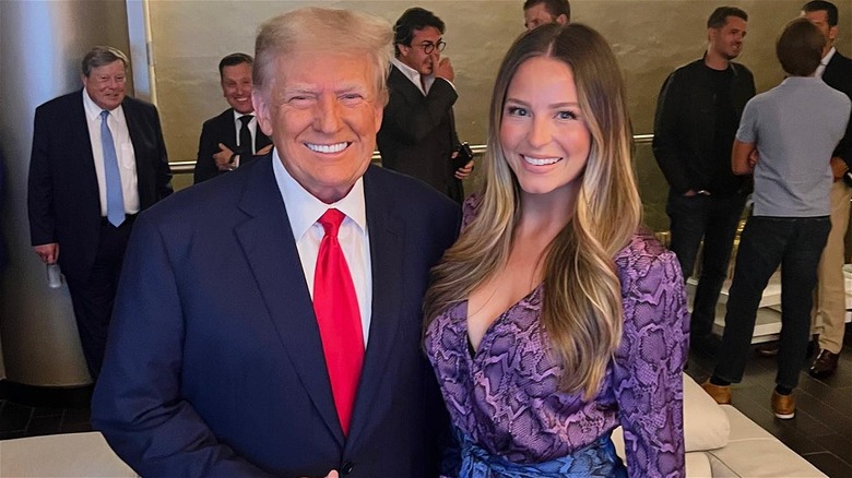 Margo Martin posing with Donald Trump