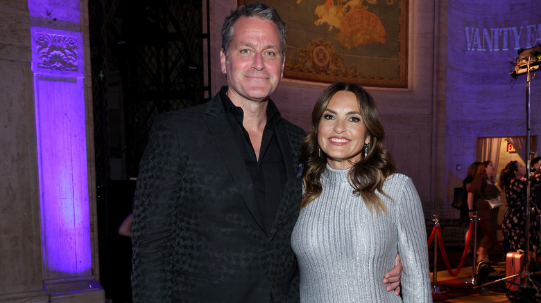 Peter Hermann and Mariska Hargitay smiling