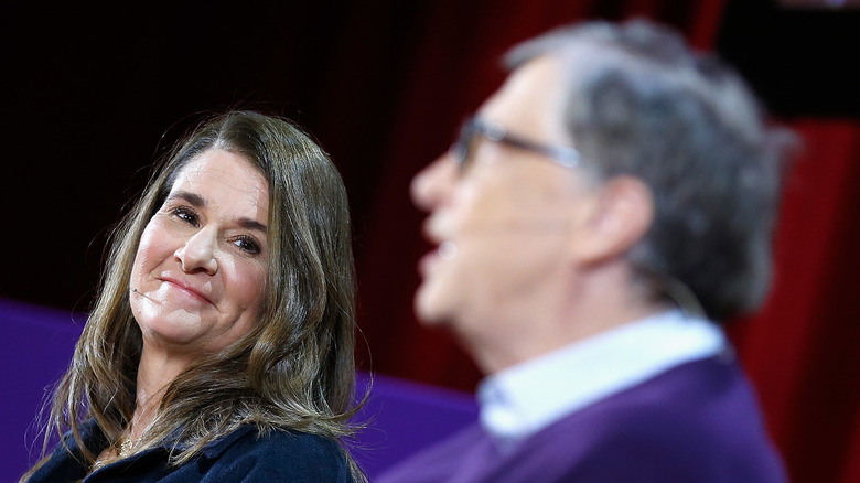 Melinda Gates with Bill Gates in foreground