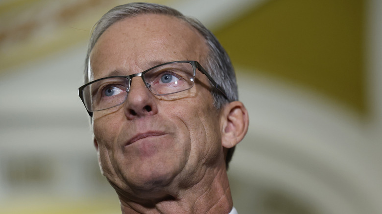 John Thune smirking